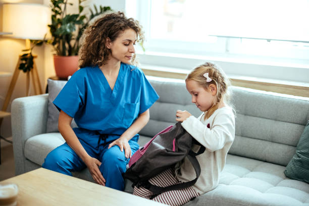 istock Mother is preparing her daughter for school 1768244308
