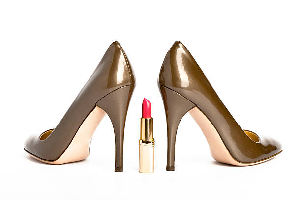 istock Shoes on a high heel and lipstick 176824442