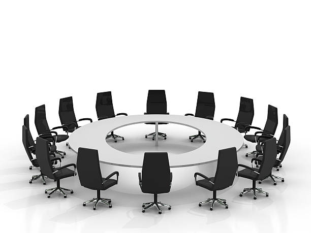 istock A round metal conference table with clack leather chairs 176824955