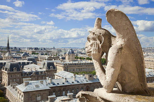 istock Chimera overlooking the skyline of Paris from Notre Dame 176825718