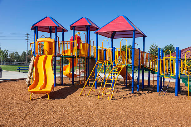 色鮮やかなプレイグラウンド - playground schoolyard playful playing ストックフォトと画像