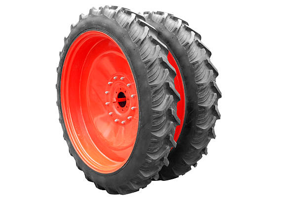 istock tractor big wheel isolated on white background 176826887