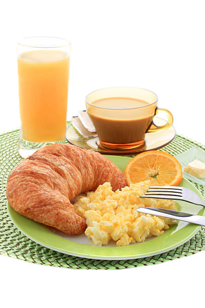 kontinentales frühstück - fork plate isolated scrambled eggs stock-fotos und bilder
