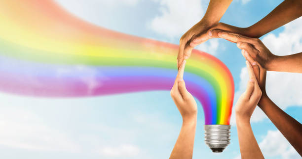istock Symbols and shapes of light bulbs created by hand. Inspirational idea unity and creative team for creativity thinking together as a diverse group of people together. concept of idea 1768289623