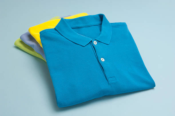 Polo shirt with blank tag. Isolated on white with shadow.