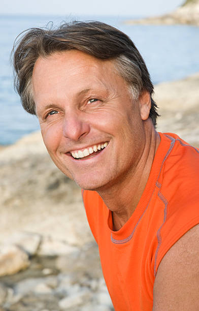 istock happy smiling outdoor man 176829449