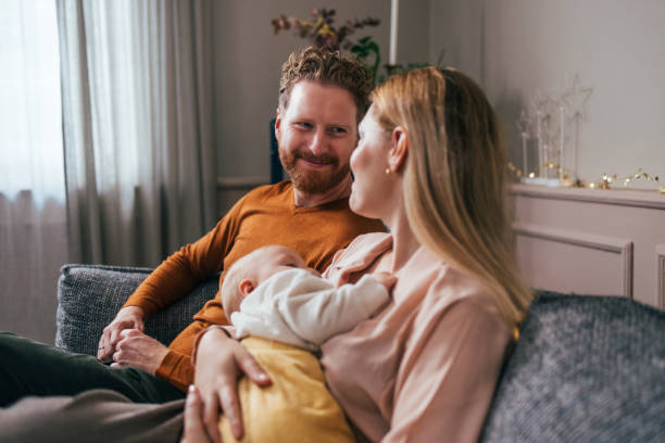 istock Family Tranquility: Mom and Dad Adore Baby's Peaceful Sleep 1768321407