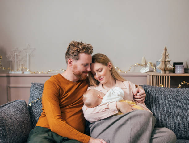 istock Family Tranquility: Mom and Dad Adore Babys Peaceful Sleep 1768323050