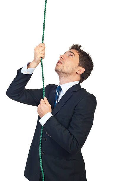 istock Business man climbing a rope 176832557