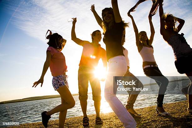 Party On Beach Stock Photo - Download Image Now - Jumping, Music, Party - Social Event