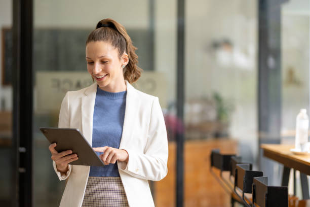 istock Smart businesswoman with digital tablet 1768331296