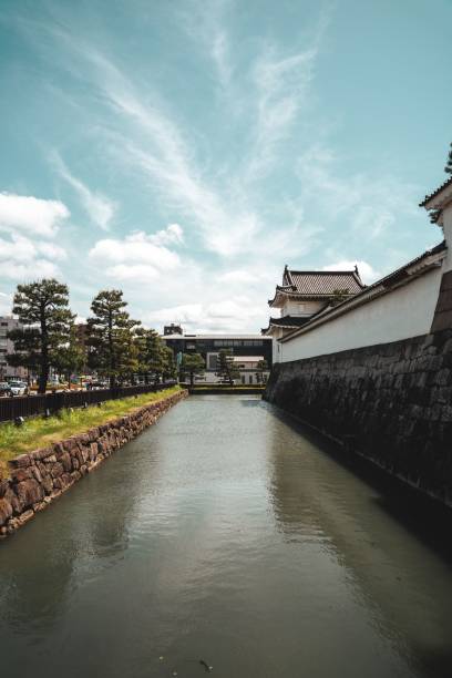 istock buildings on the side of a canal next to a river 1768331369