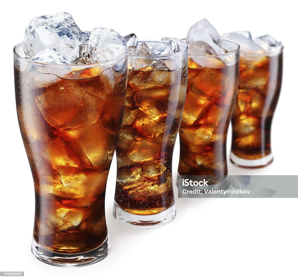 Glasses with cola and ice cubes Glasses with cola and ice cubes on a white background Cola Stock Photo