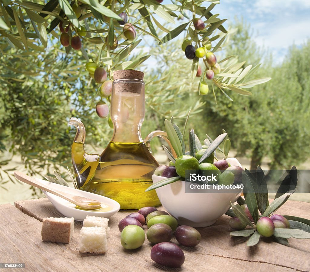 Oil and olives Tasting olive oil and freshly harvested olives. Agriculture Stock Photo