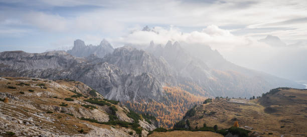 istock Autumnal alpine panorama with sharp mountains and fall colours, Dolomites, Italy 1768334465