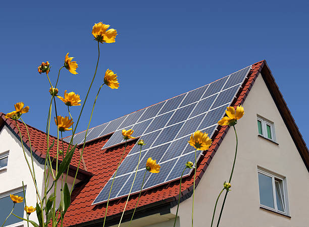 Solar panels on a roof stock photo