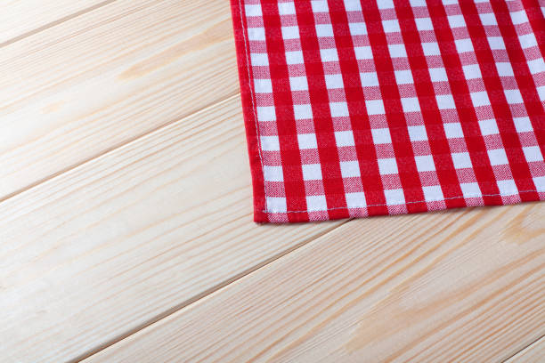 istock Red Checkered napkin on wooden background 1768342429