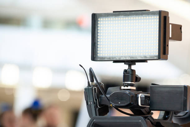 istock Led lights panel on the camcorder. Professional video camera set. Front view of camcorder lens close up. 1768342697