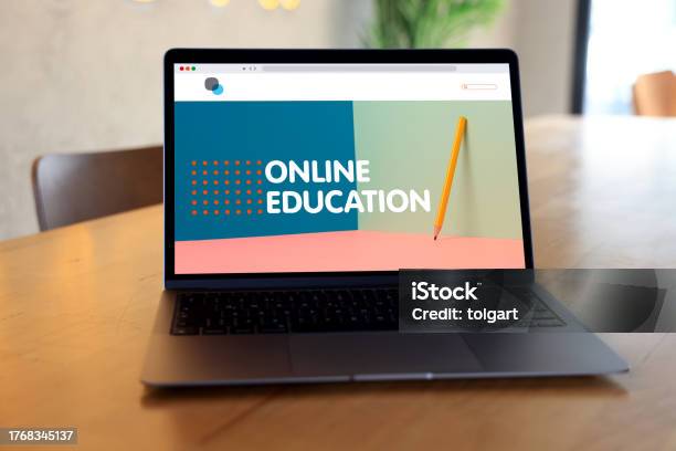 Laptop Displaying Elearning Laptop With Elearning Screen On A Desk Stock Photo - Download Image Now ...