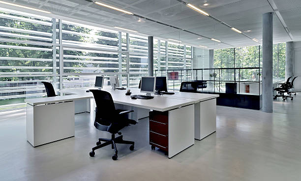 Office building with several workstations stock photo