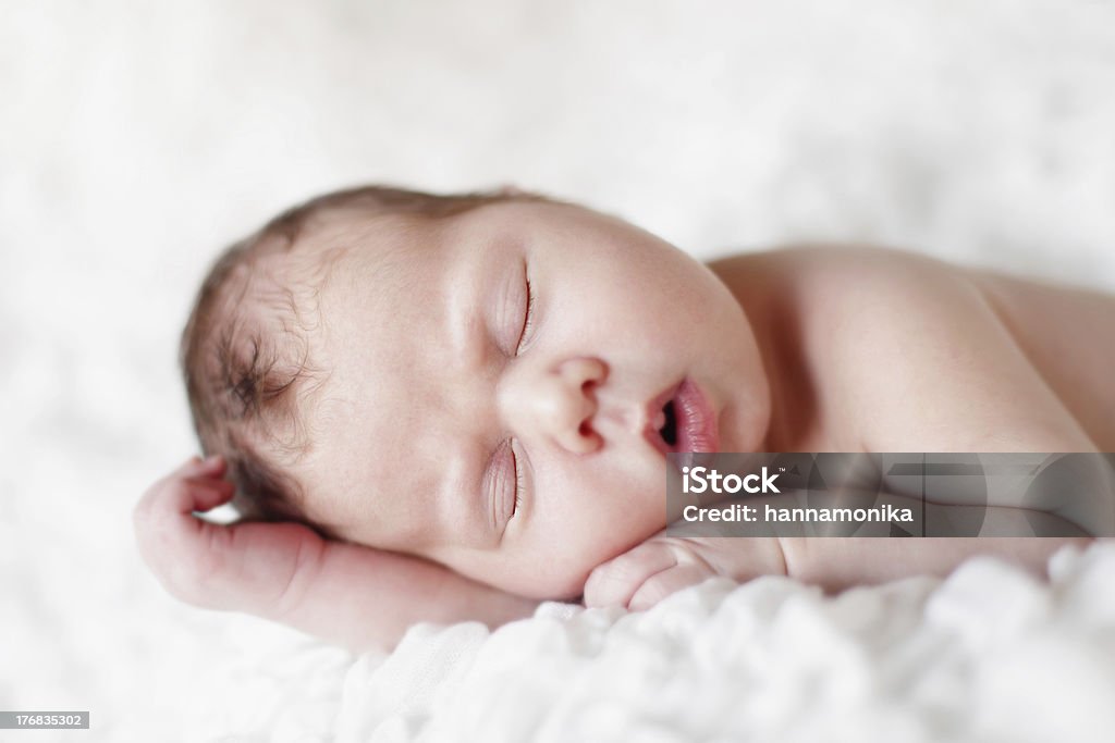 Newborn Baby "Newborn baby sleeping. Soft focus, shallow DoF.See other images from this series in the lightbox:" 0-1 Months Stock Photo