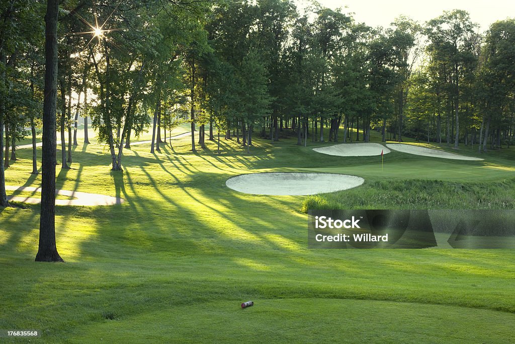 Golf green and tee box in late afternoon sunlight Golf green and tee box in late afternoon sunlightOthers you may like: Golf Stock Photo