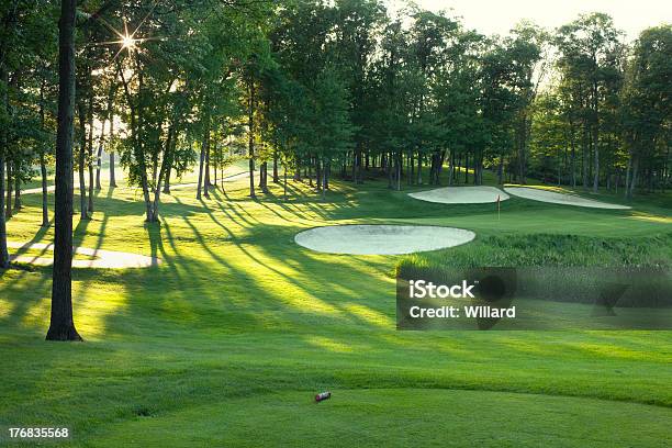 Golf Green And Tee Box In Late Afternoon Sunlight Stock Photo - Download Image Now - Golf, Green - Golf Course, Green Color