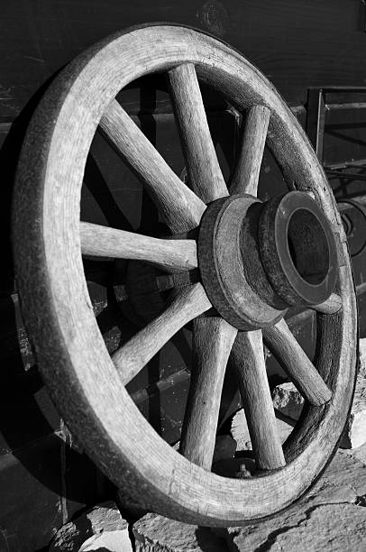istock Old and used wagon wheel in b&w. 176835950
