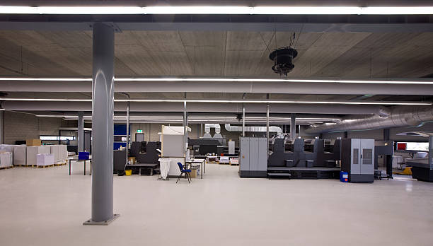 istock Printing presses with stacks of paper 176835988