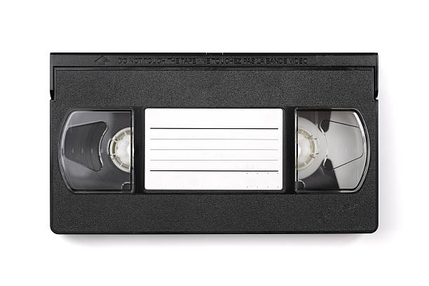 Video cassette tape with copyspace Old VHS format video cassette tape with blank label for copyspace audio cassette blank vcr film reel stock pictures, royalty-free photos & images