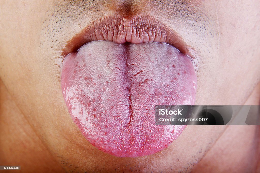 tongue close up shot of male tongue Taste Bud Stock Photo