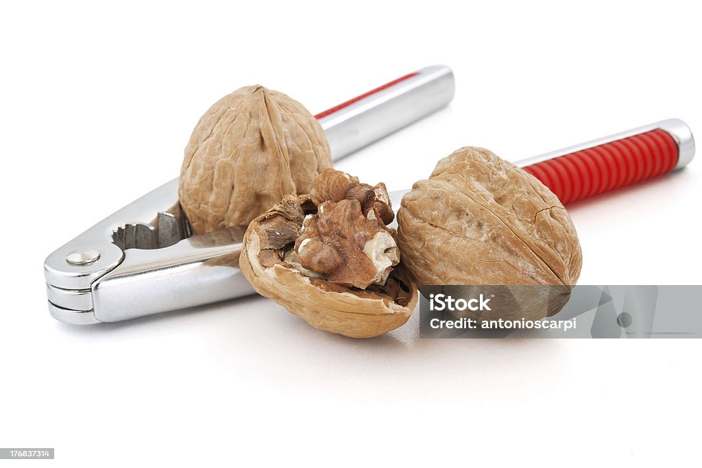 Schiaccianoci e noci - Foto stock royalty-free di Alimentazione sana