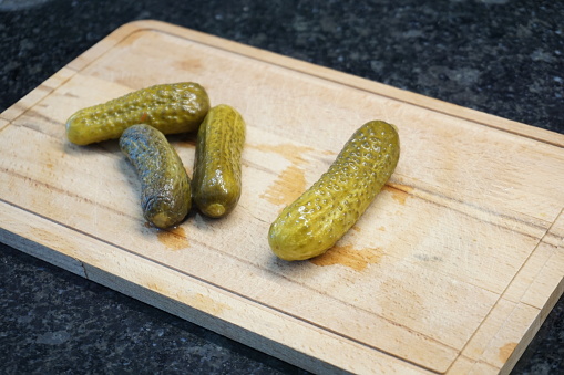 Pickled cucumber. Pickled sliced ​​and whole cucumbers.