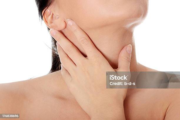 Closeup Of A Young Woman Clutching A Sore Throat Stock Photo - Download Image Now - Adult, Adults Only, Allergy