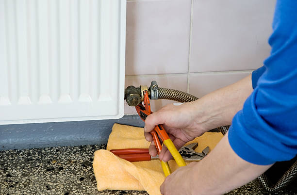 istock hands of a plumber repairman 176838697