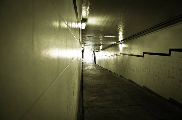 istock Dirty, grimy tunnel with light at the end 176838872