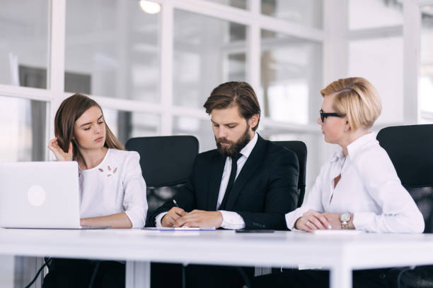 istock managers working with project statistics or marketing strategy brainstorm in the office. 1768390416