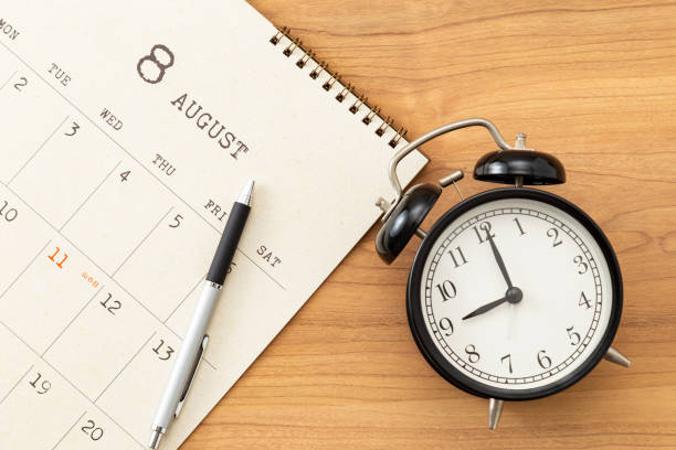 istock A calendar and an alarm clock on the desk. 1768391546