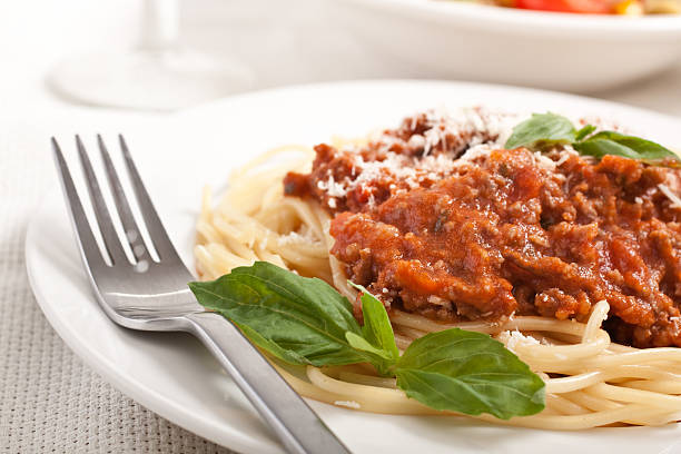 istock Spaghetti bolognese with cheese and basil 176839424