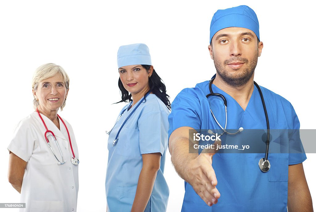 Equipo médico personas apretón de manos - Foto de stock de Actitud libre de derechos