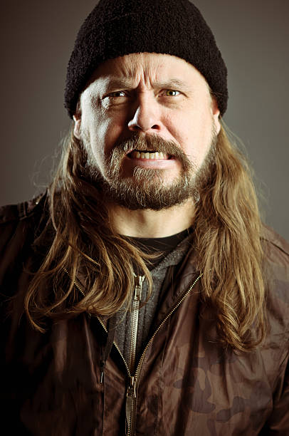 istock Angry Bearded Long Hair Man Making A Face 176840918