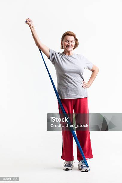 Stretching With A Rubberband Stock Photo - Download Image Now - 60-69 Years, 70-79 Years, Active Lifestyle
