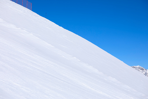 Perfect ski slope.  High mountain  landscape  At the top. Italian Alps  ski area. Ski resort Livigno. italy, Europe.