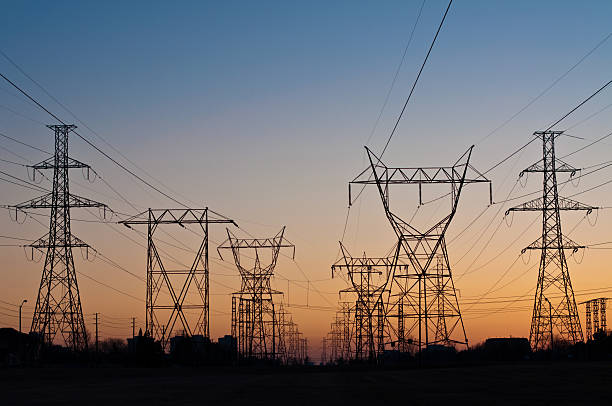 istock Electrical Transmission Towers (Electricity Pylons) at Sunset 176841557