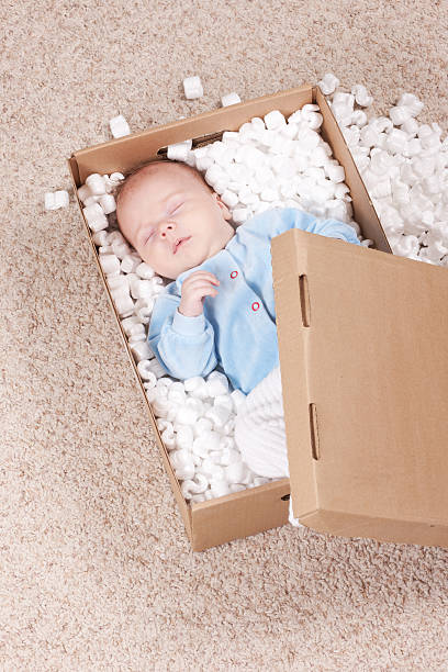 istock Newborn baby in open post box 176841583