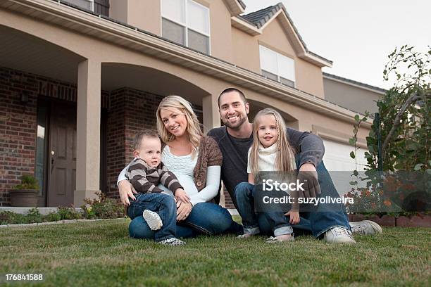 Family In Front Of Their New House Stock Photo - Download Image Now - In Front Of, Family, House