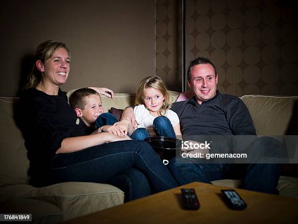 Family In Front Of The Tv Stock Photo - Download Image Now - In Front Of, Television Set, Family