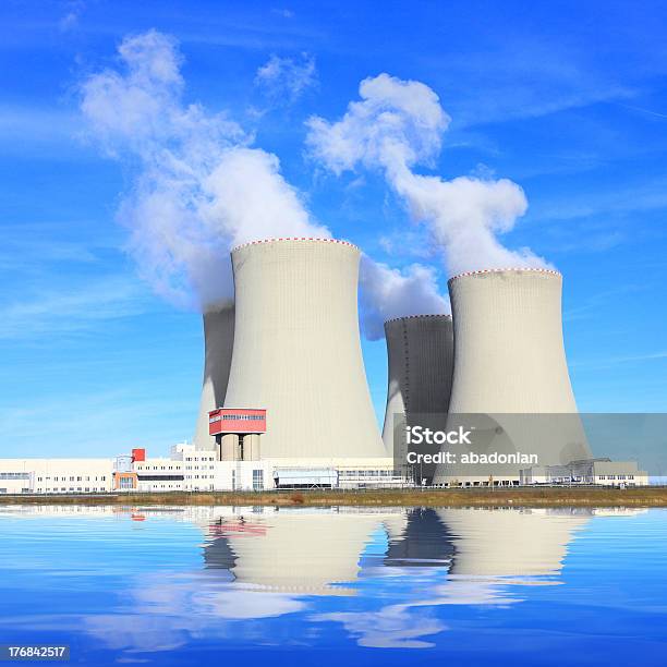 The Four Cooling Towers Of A Nuclear Power Plant Stock Photo - Download Image Now - Architecture, Building Exterior, Condensation