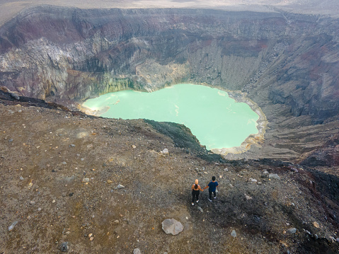 Drone view of the top of active volcano crater