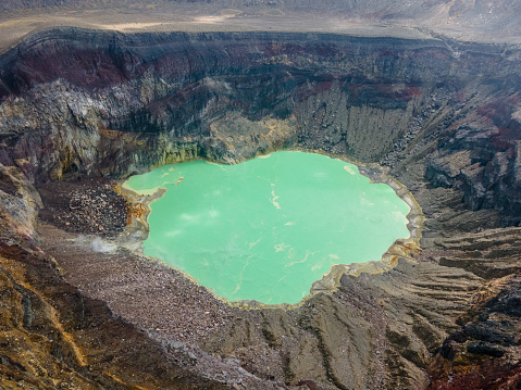 The top view inside a volcano which is erupting in the Java island in Indonesia